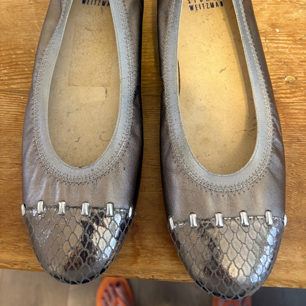 Stuart Weitzman ballet slippers in silver.  Size 6.5.